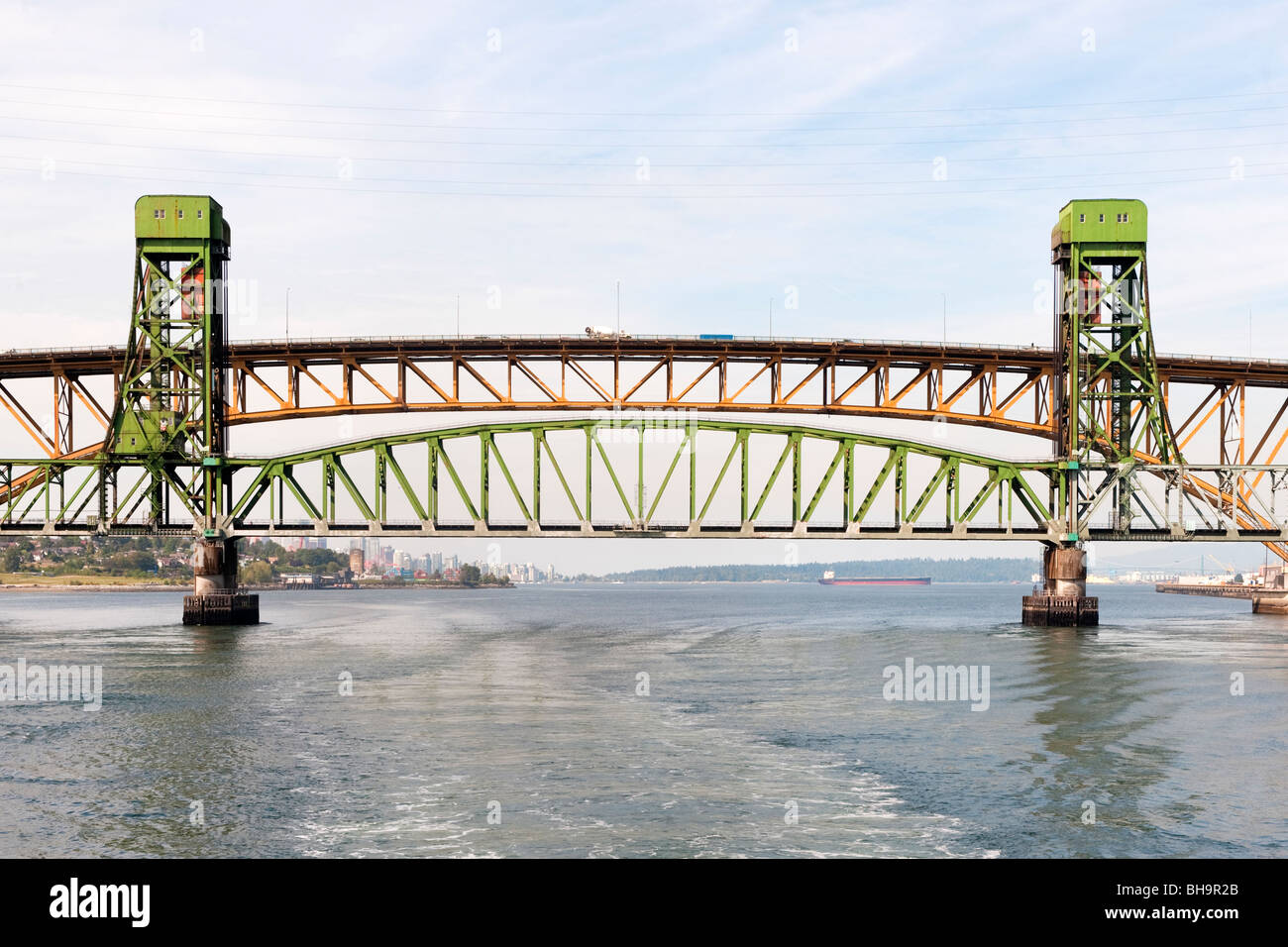 Second Narrows railway bridge, in front, with Ironworkers Memorial