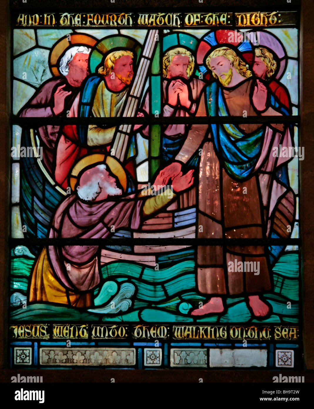 A stained glass window designed by Horatio Walter Lonsdale depicting Jesus walking on water, Church of Christ the Consoler, Skelton-on-Ure, N Yorks Stock Photo