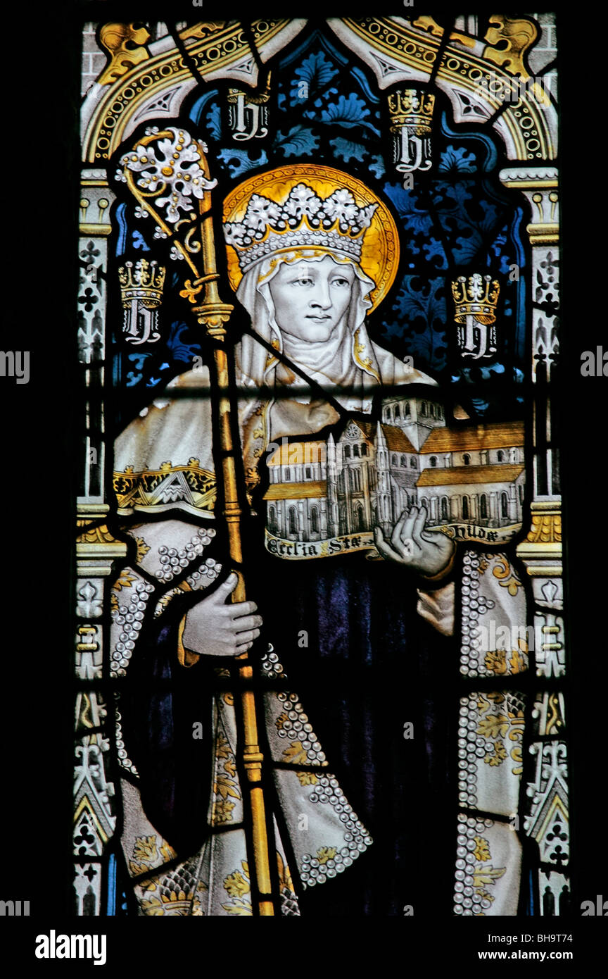 Detail from a stained glass window depicting Saint Hilda, founder of Whityby Abbey,  by The Kempe Studio, St Hilda's Church, Beadlam, North Yorkshire Stock Photo