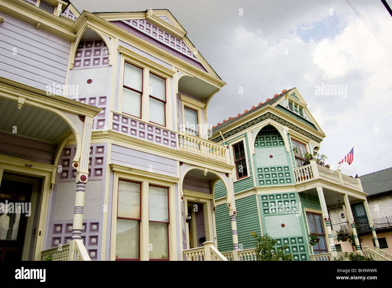 Two colorful homes located in the Garden District of New Orleans. Stock Photo