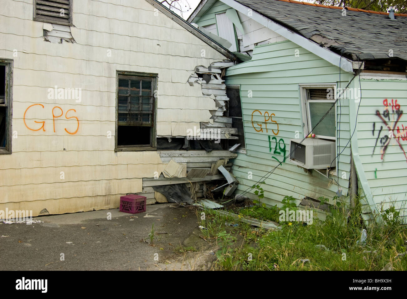 Homes which floated off their foundations in the flooding after Hurricane Katrina. Lower 9th Ward, New Orleans, LA. Stock Photo