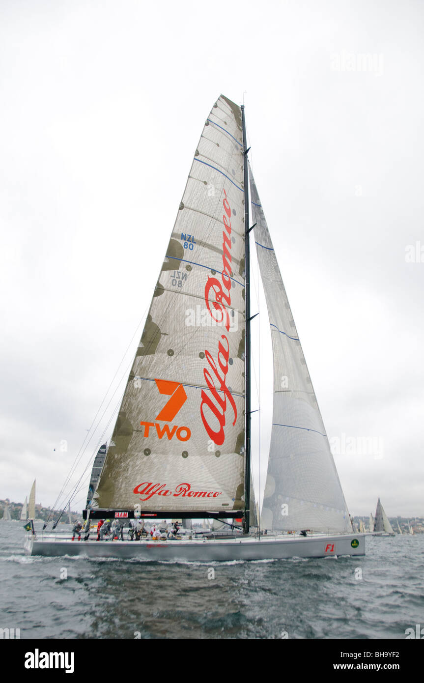 SYDNEY, Australia - SYDNEY, Australia - Super maxi yach Alfa Romeo at the start of the 2009 Rolex Sydney to Harbour Yacht Race in Sydney Harbour. Alfa Romeo was the eventual winner on overall line honors.. It was skippered by Neville Crichton. Stock Photo