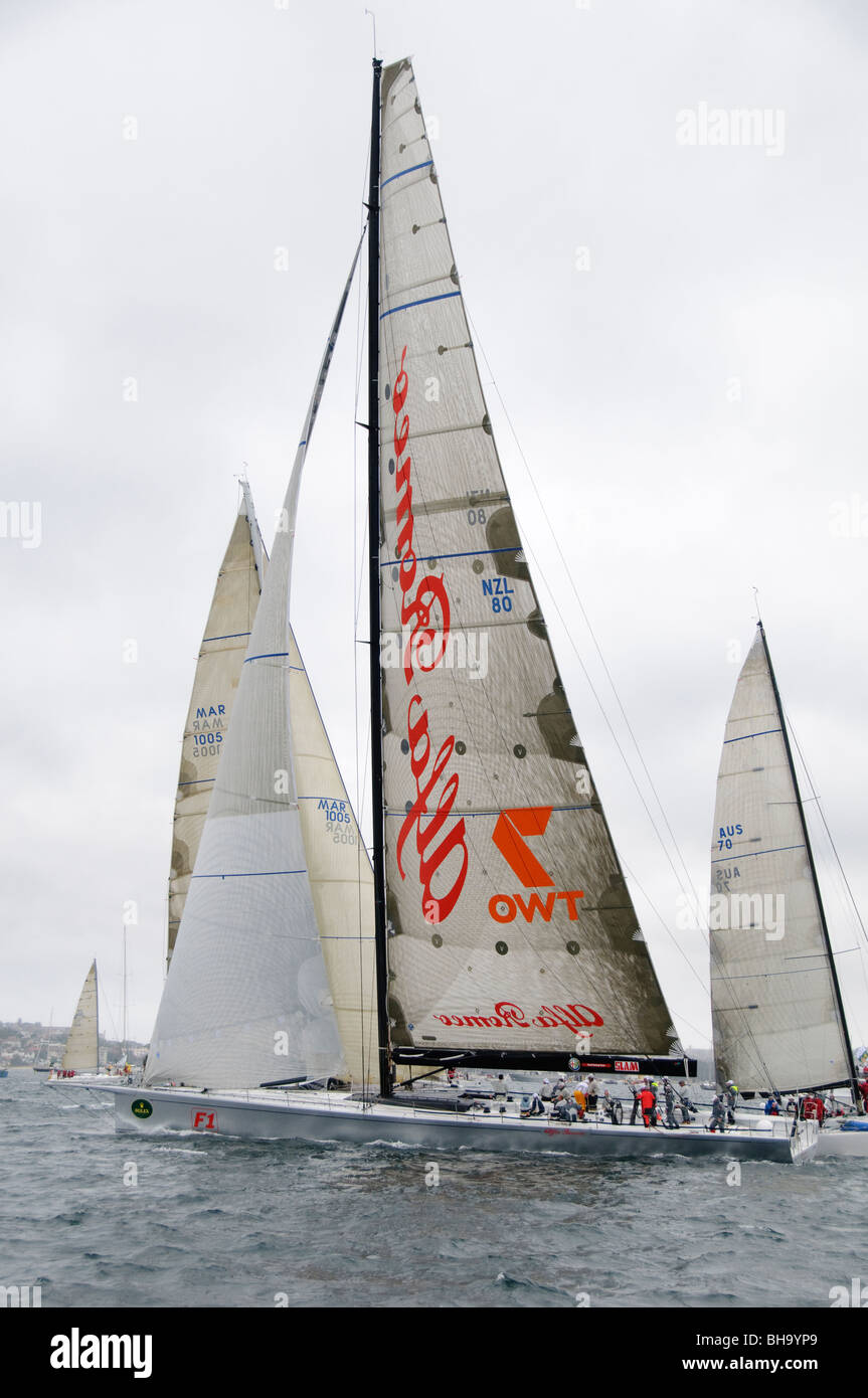 SYDNEY, Australia - SYDNEY, Australia - Super maxi yach Alfa Romeo at the start of the 2009 Rolex Sydney to Harbour Yacht Race in Sydney Harbour. Alfa Romeo was the eventual winner on overall line honors.. It was skippered by Neville Crichton. Stock Photo