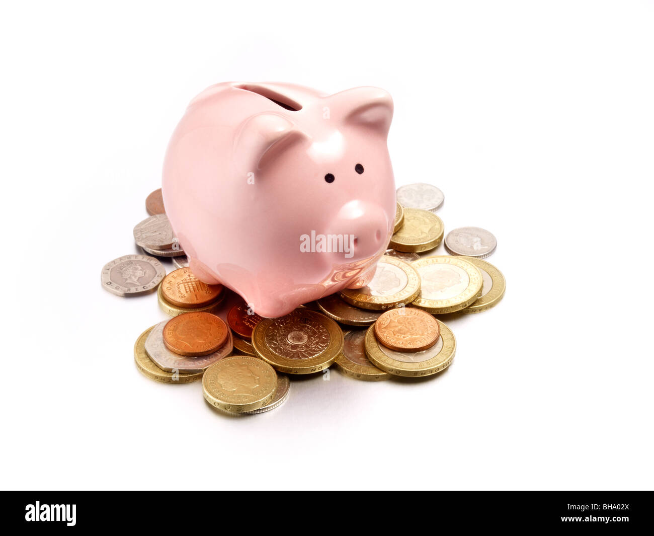 piggy bank on coins of the pound sterling Stock Photo