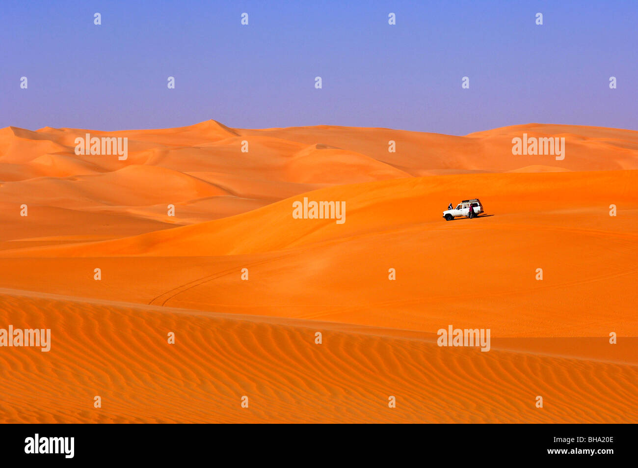 Fourwheel drive car driving in the sand dunes in the Awbari Sand Sea