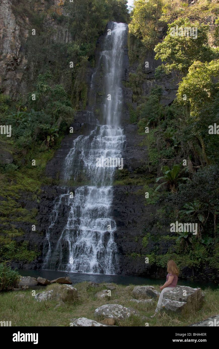 A tourist enjoys the view of the stunning Bridal Veil Falls in Zimbabwe