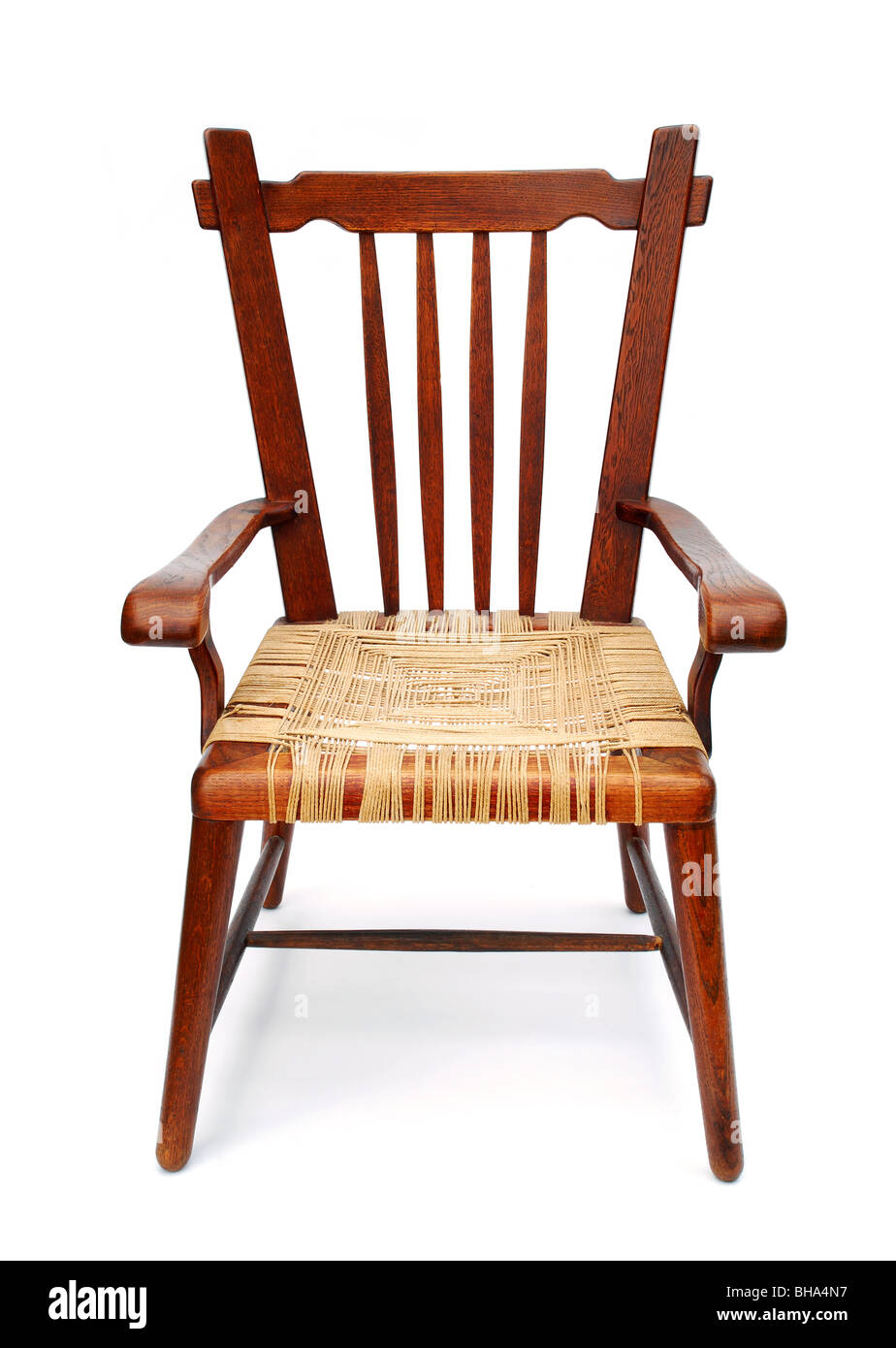 Wooden armchair with plaited seat, 1930s, isolated on white background Stock Photo