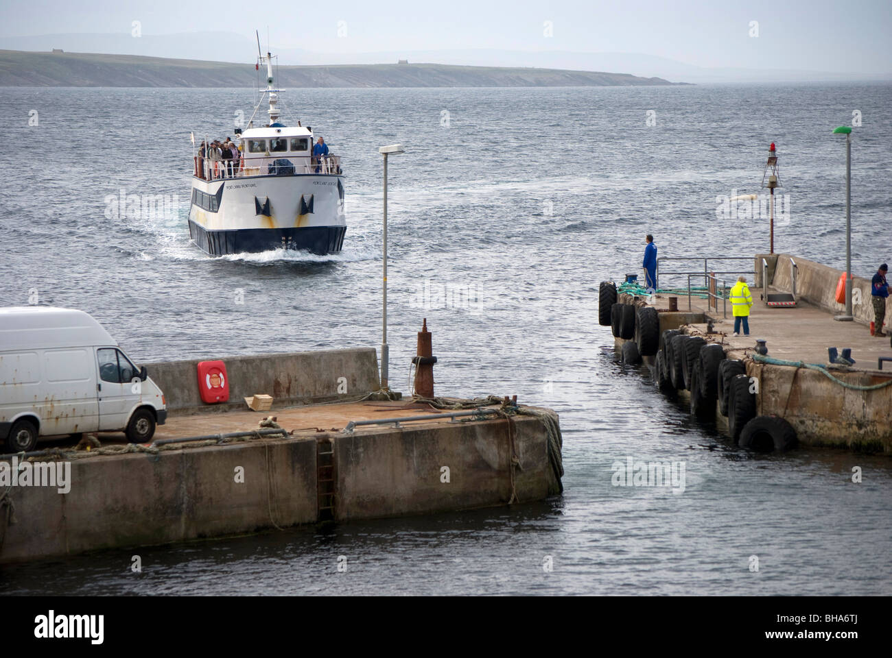 Orkney passenger ferry approaching John O'Groats harbour in the far north-east corner of Scotland. Stock Photo