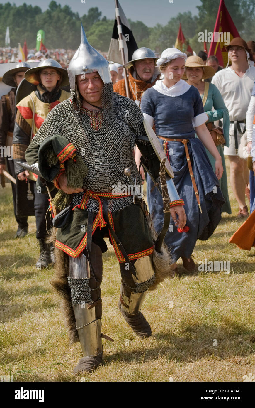 Reenactors leaving battlefield after recreating 1410 Battle of Grunwald Warminsko-Mazurskie, Poland Stock Photo