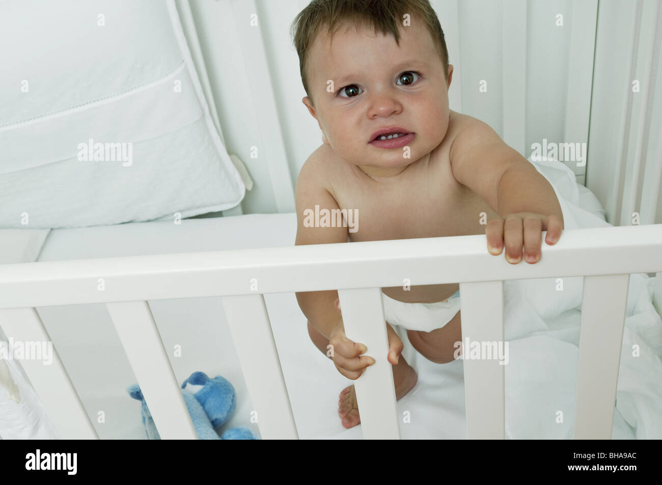 Baby and cot and crying hires stock photography and images Alamy