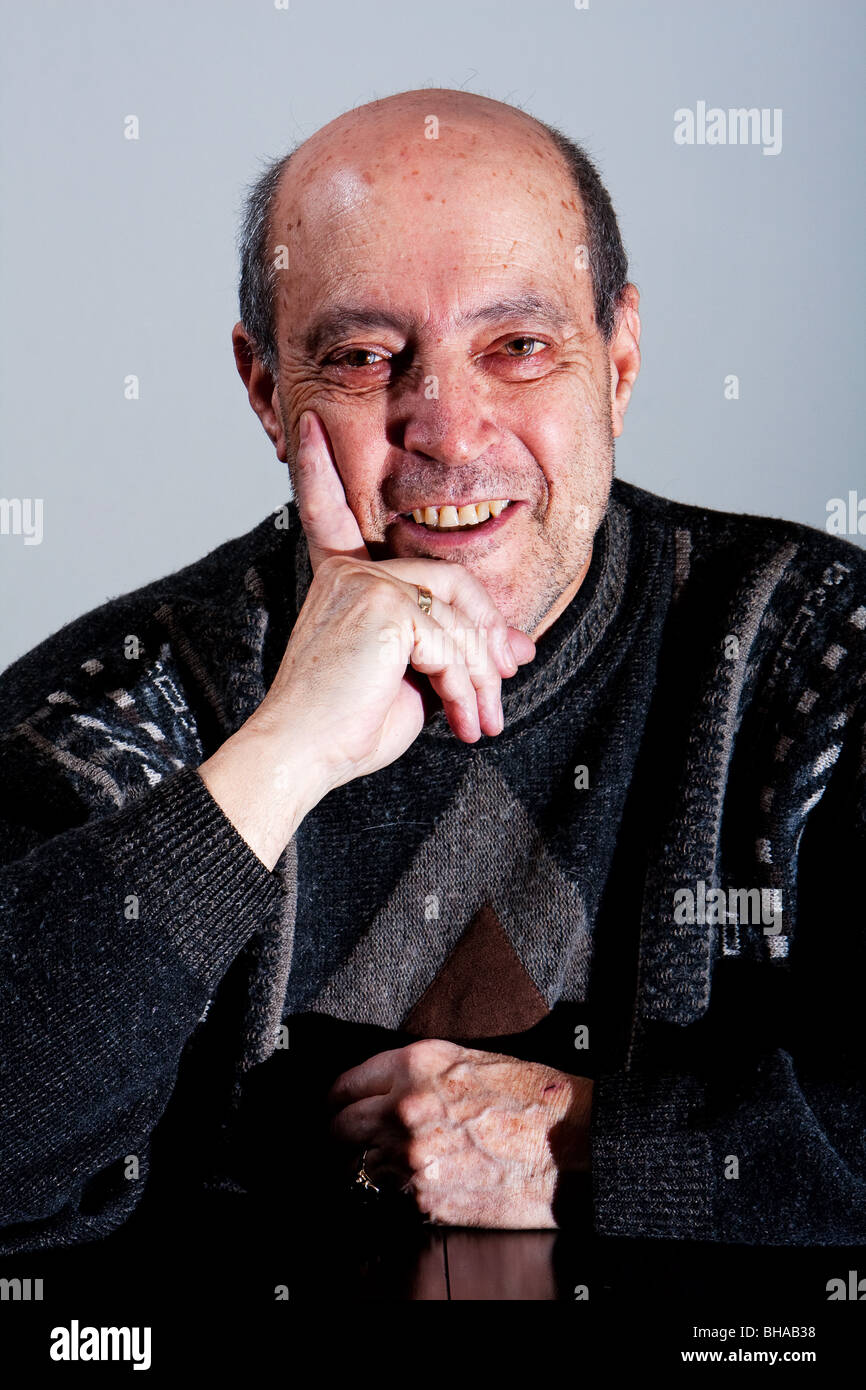 Face of an old man with little hair and bald spot and hand on his chin with  happy smiling expression, isolated Stock Photo - Alamy