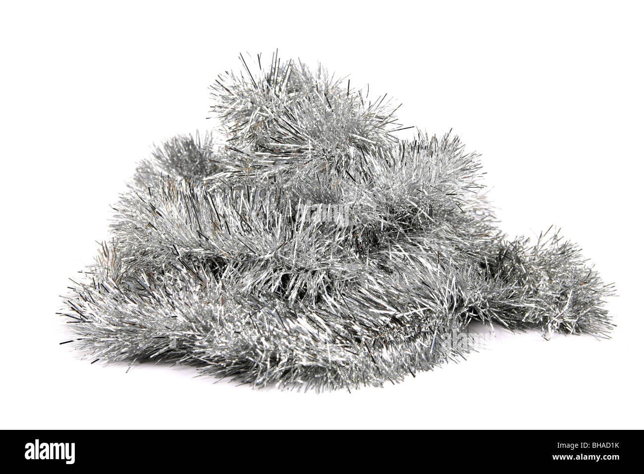 Silver Tinsel against a white background Stock Photo Alamy