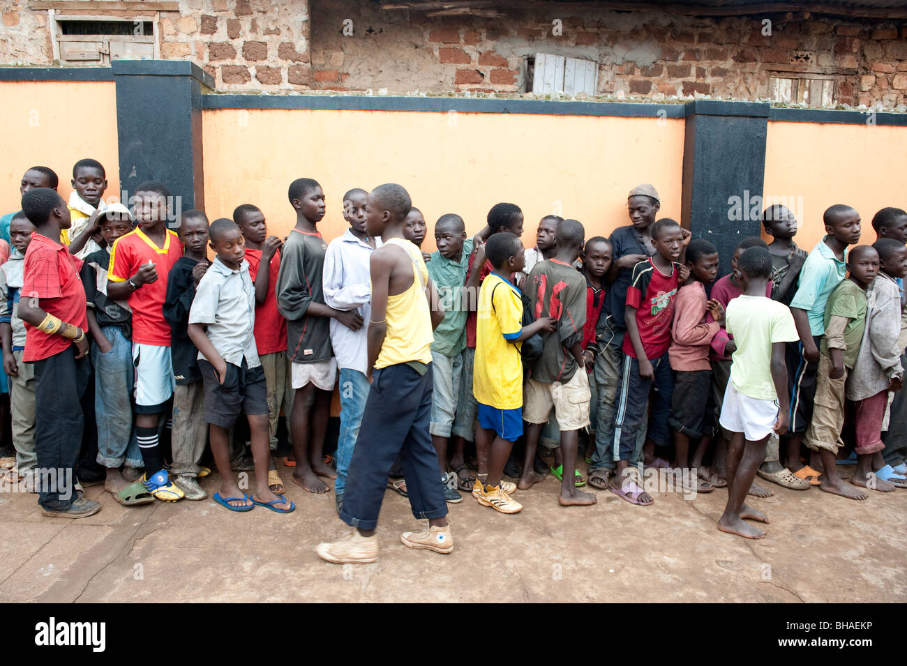 Street boys queuing for a meal at Retrak Uganda, Kampala. Stock Photo