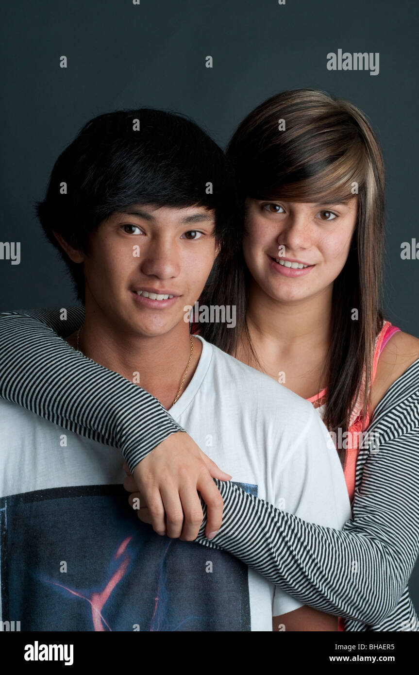 Young Eurasian girl (quarter Chinese) with her Asian (Lao/Hmong) boyfriend Stock Photo