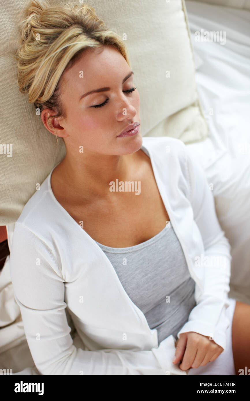 Woman sitting comfortably eyes hi-res stock photography and images - Alamy