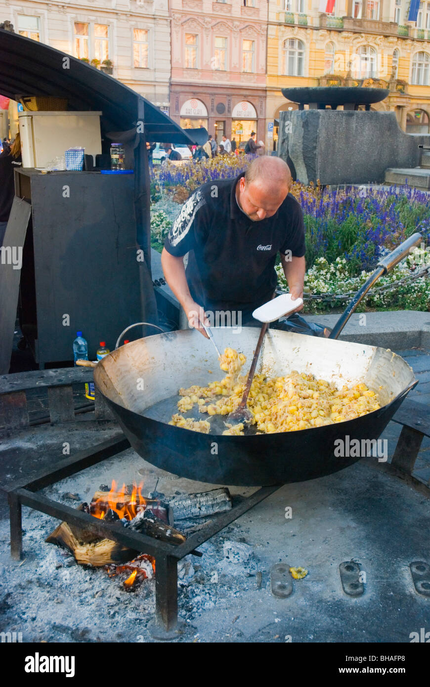 Food cooked in a giant wok pan at old town square in Prague Czech Republic  Europe Stock Photo - Alamy