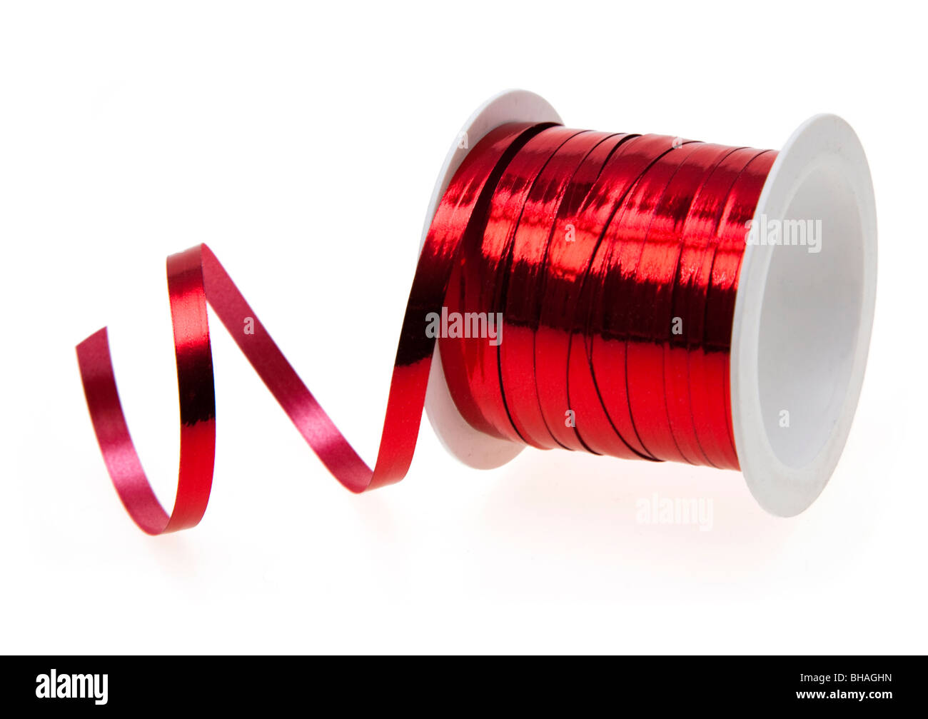 Red ribbon on spool Stock Photo