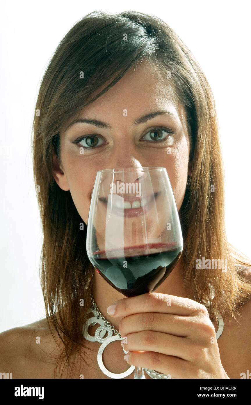 Young woman with a glass of red wine Stock Photo - Alamy