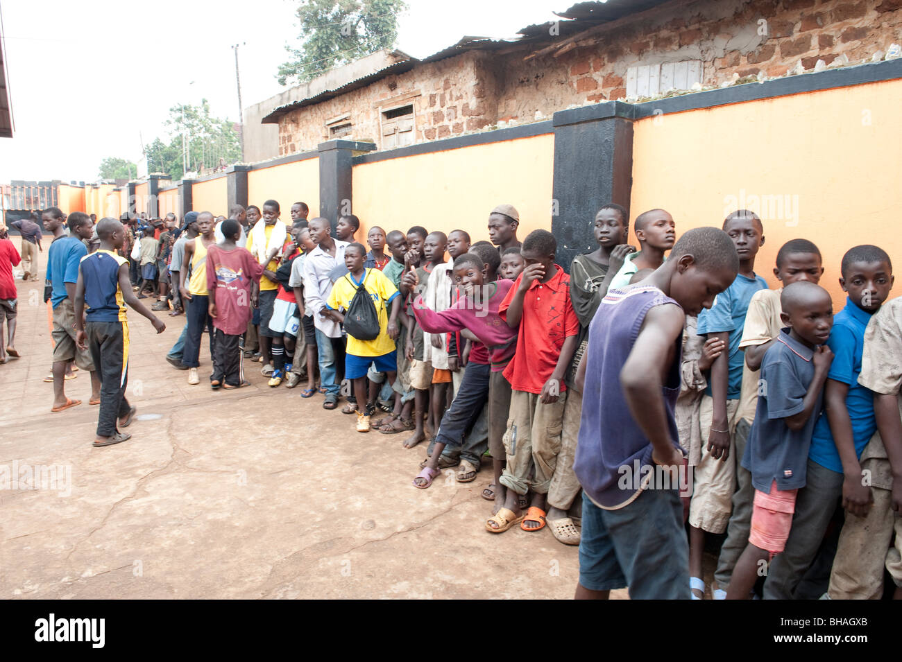 Street boys queuing for a meal at Retrak Uganda, Kampala. Stock Photo