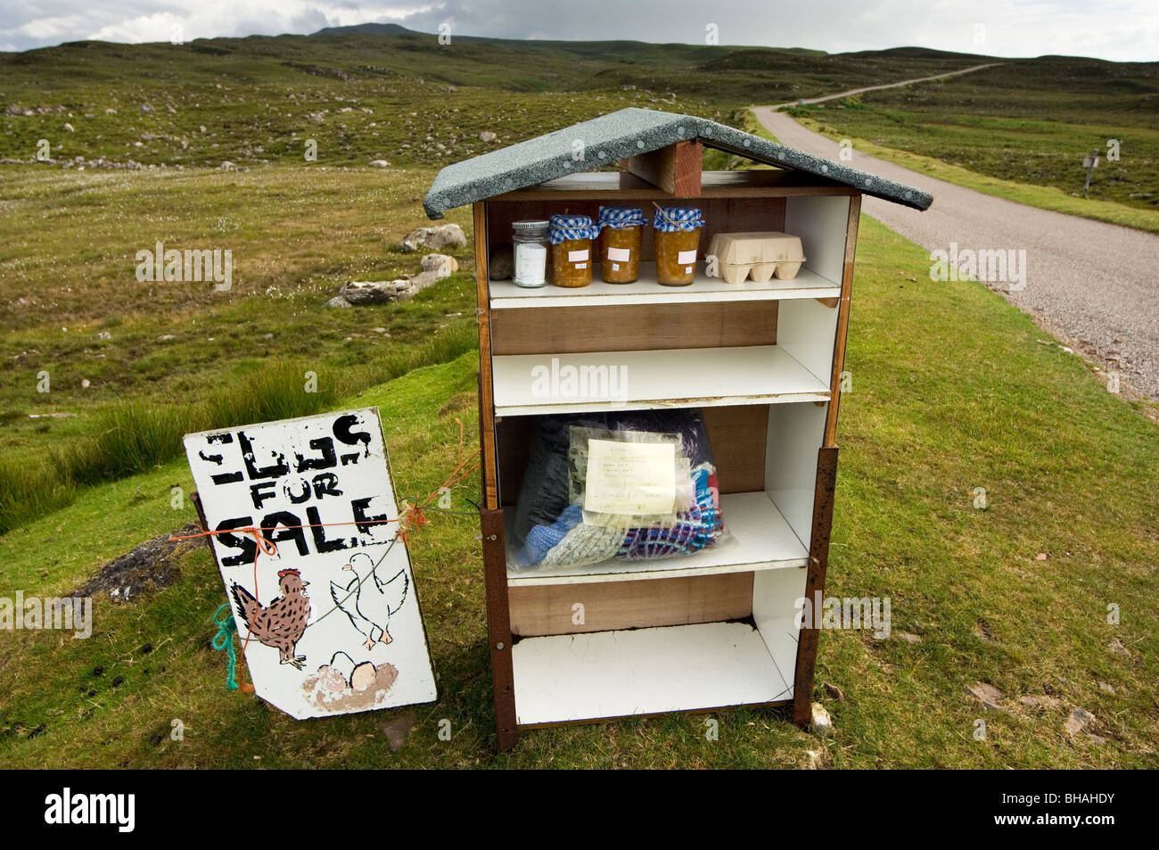 roadside stall selling eggs jams and knitwear scotland Stock Photo Alamy