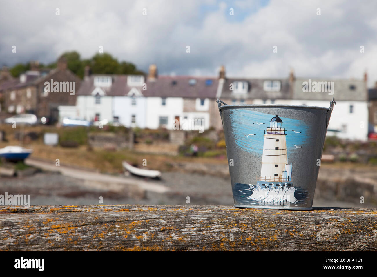 Pail with image of lighthouse on it Stock Photo