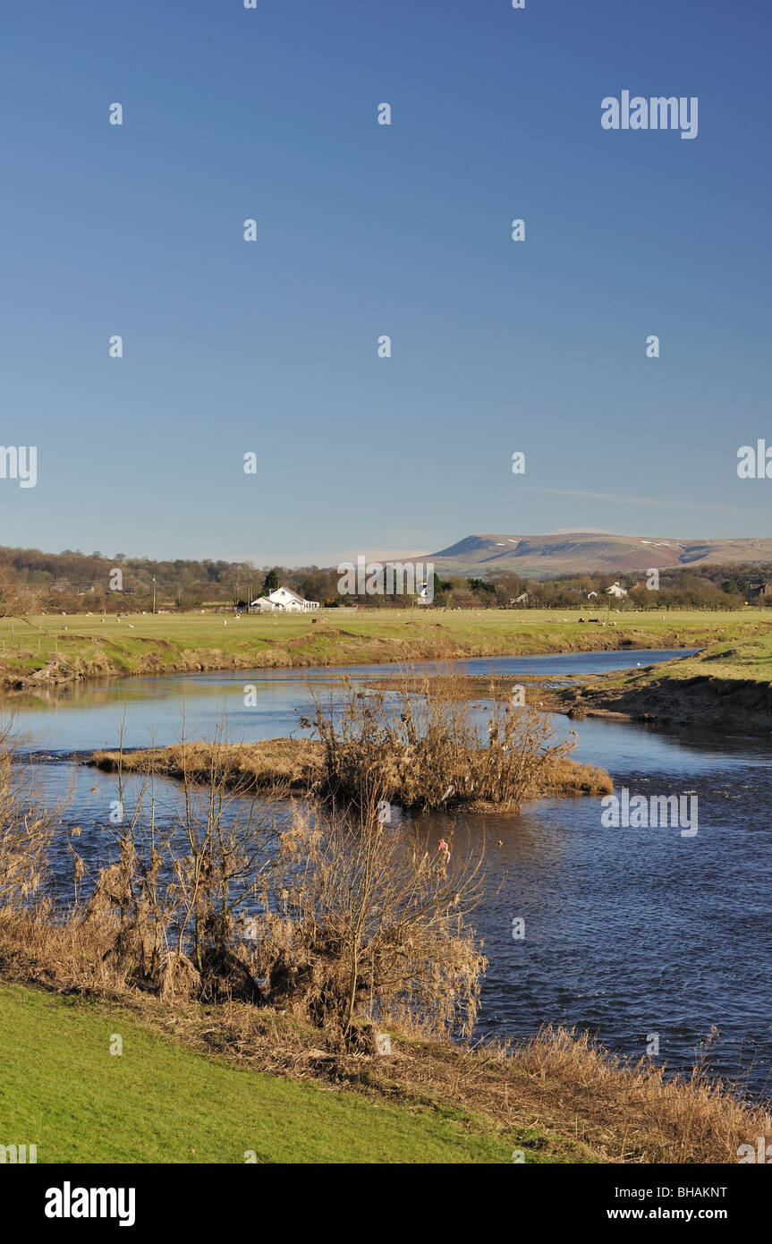 The River Ribble at Ribchester, Lancashire, England, with Pendle Hill in the distance. Stock Photo