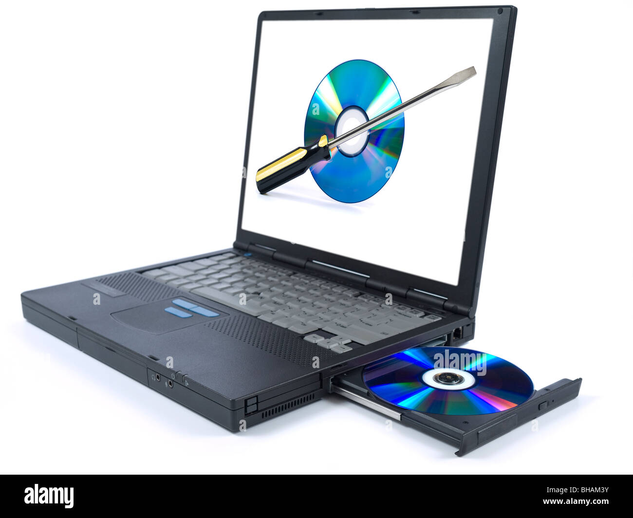 Isolated black laptop with a DVD in tray and a technical support icon on the screen. Stock Photo