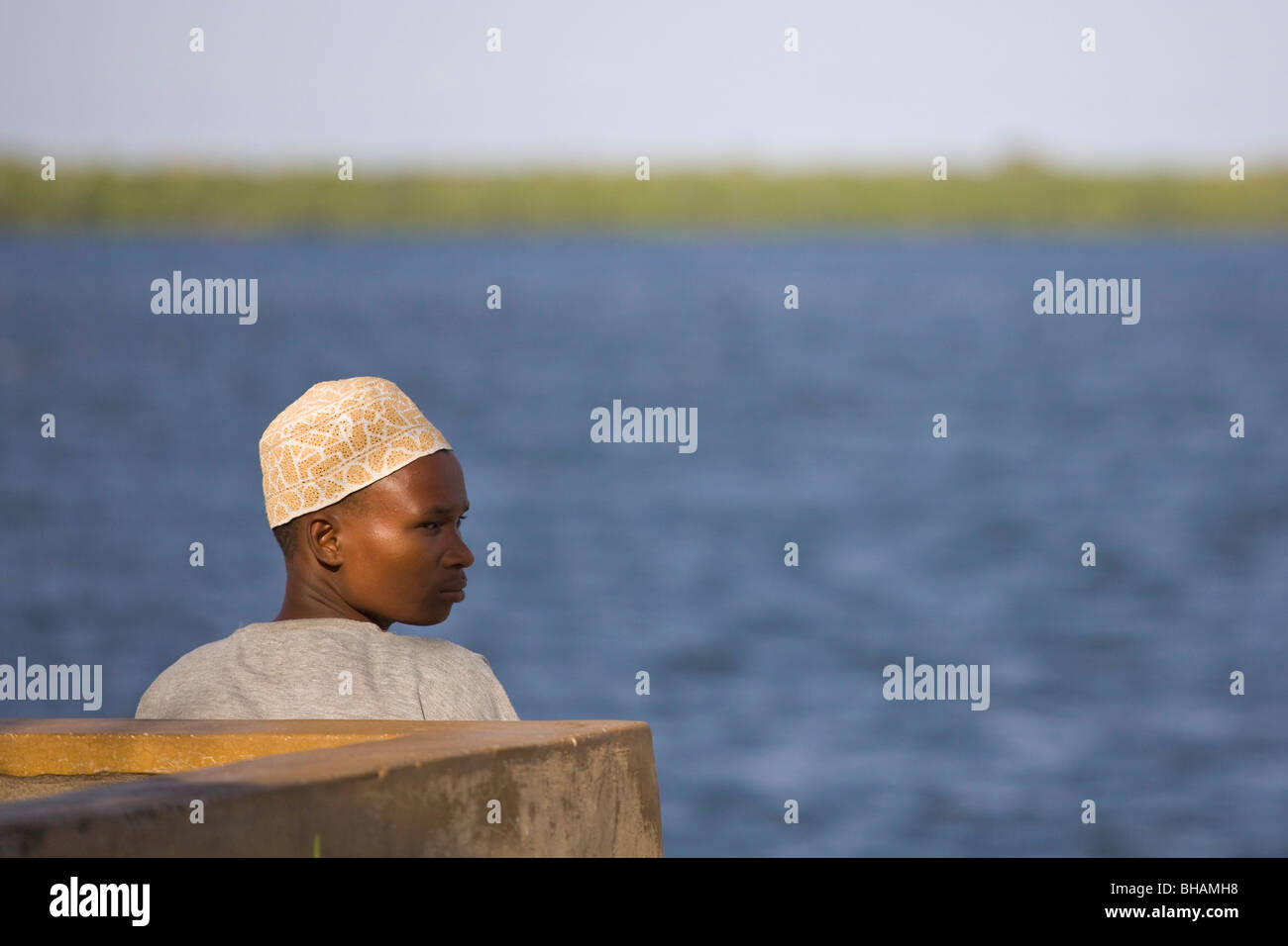 Young man wearing kofia cap, Lamu, Kenya Stock Photo