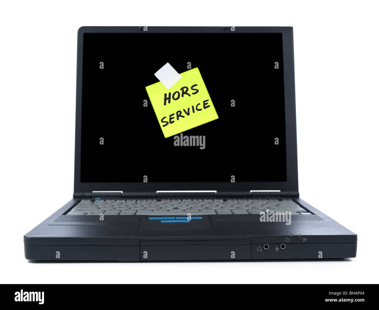 Black laptop with a sticky note in french meaning Out of Service. Isolated on white.RA Stock Photo