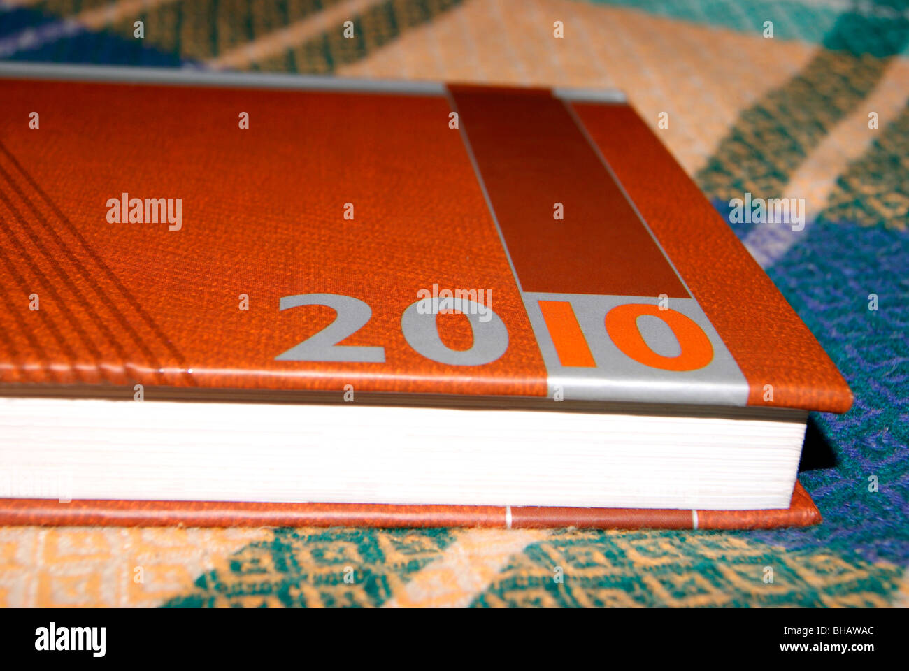 2010 Dairy book fallen on Bed Stock Photo