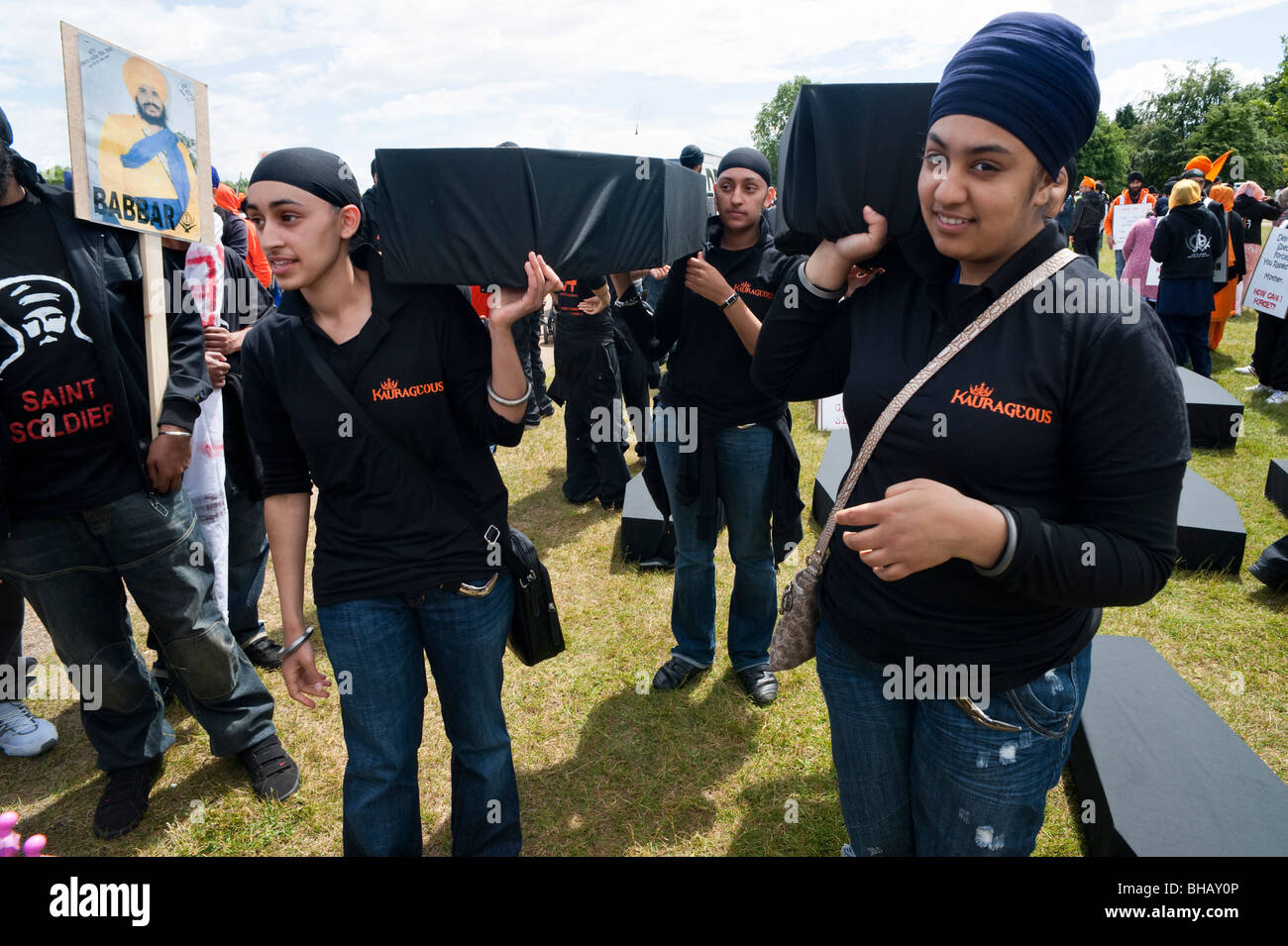 Young Sikhs carry coffins on march in London calling for justice over the 1984 massacres and an independent Sikh state Stock Photo