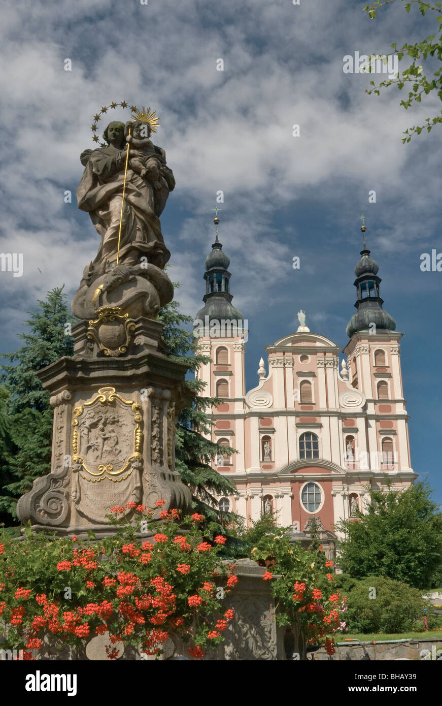 Holy Mary with Jesus statue at Rynek and Saint Nicholas Church in Otmuchów, Opolskie, Poland Stock Photo