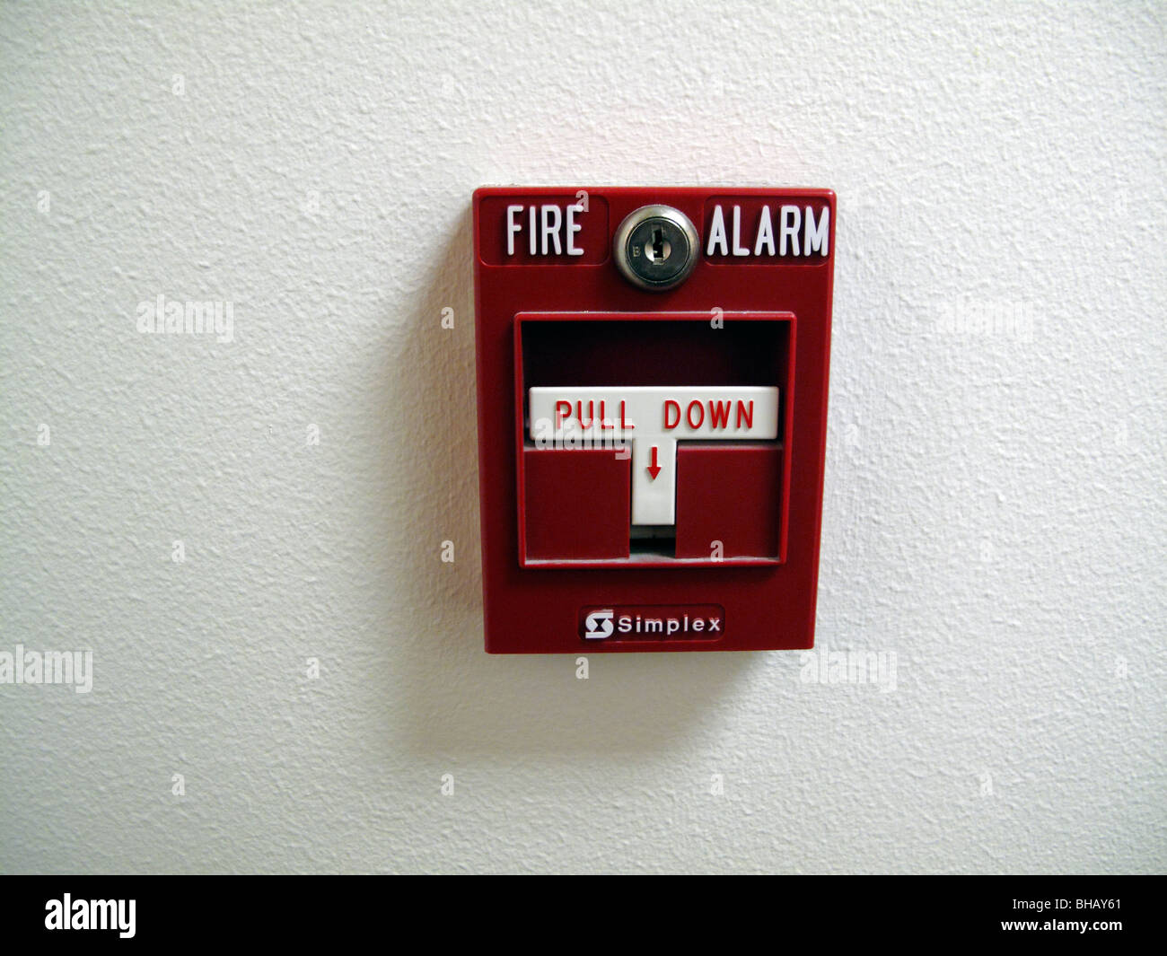 Fire alarm on white wall Stock Photo Alamy