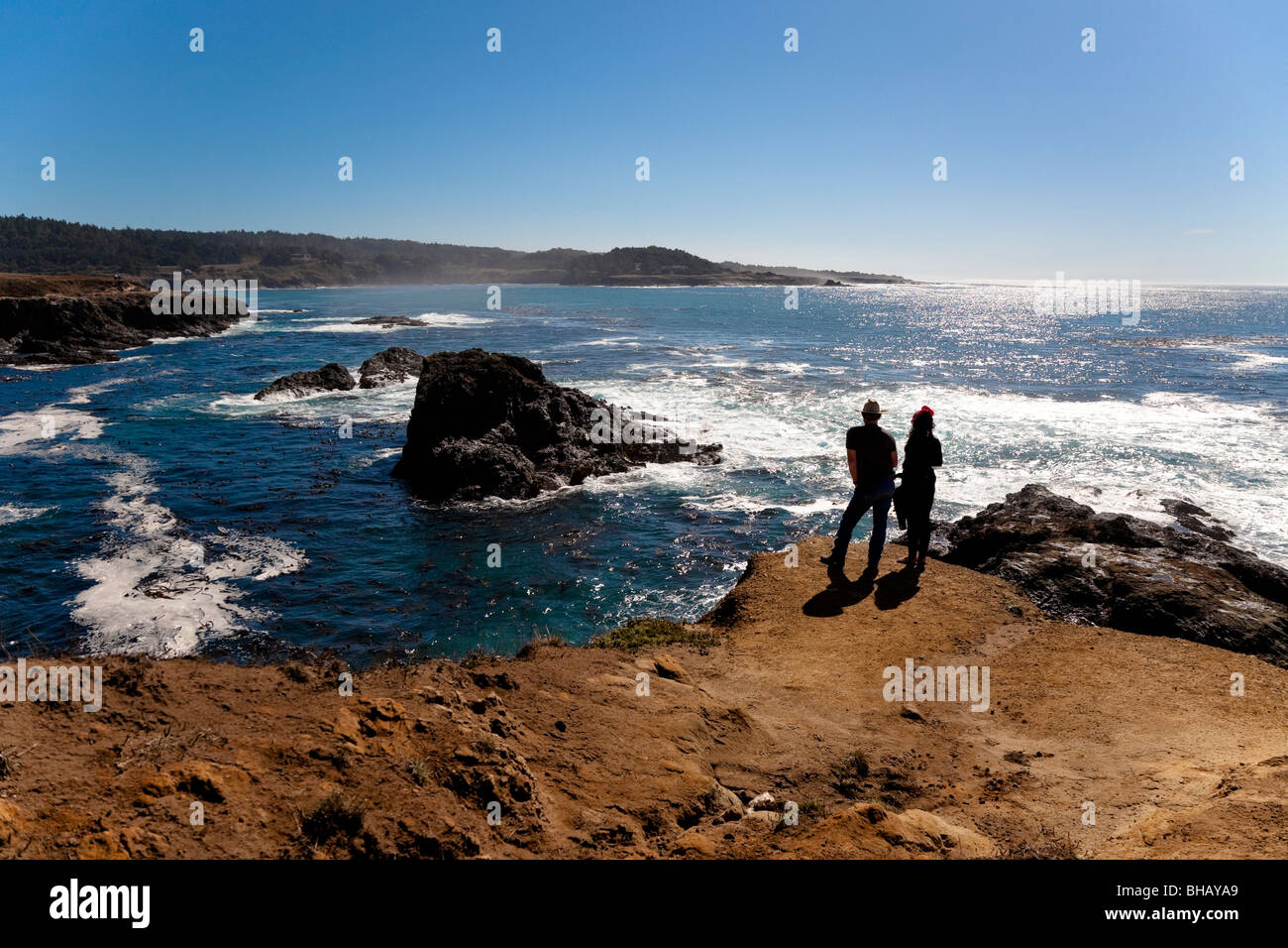 Silhouetted couple standing on Mendocino headlands, Northern California, USA Stock Photo