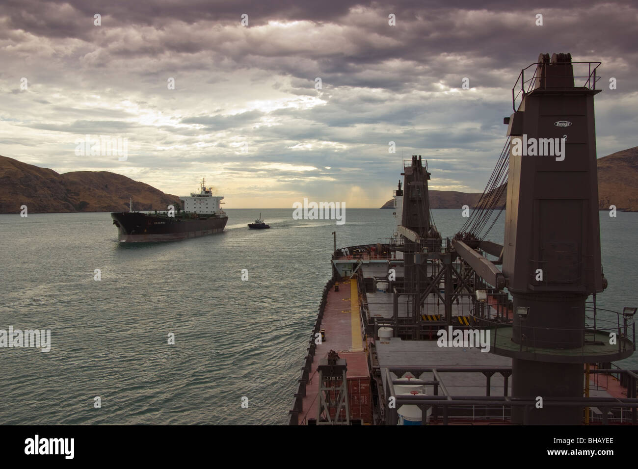 Ship's passing in the channel to and from the port of Lyttelton, New Zealand. Stock Photo