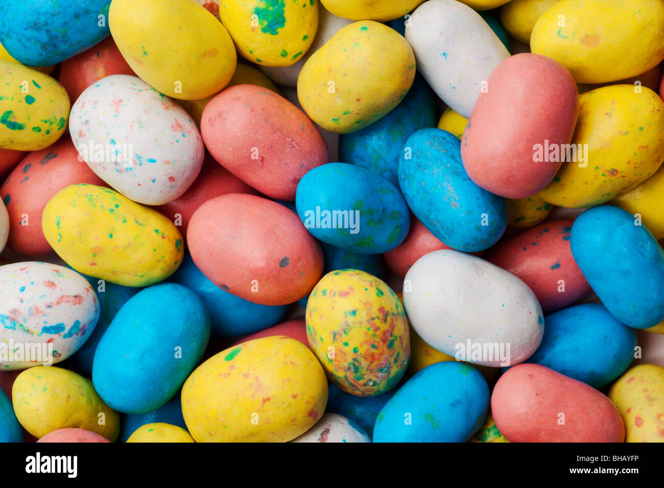 speckled eggs multi colored backdrop or background Stock Photo