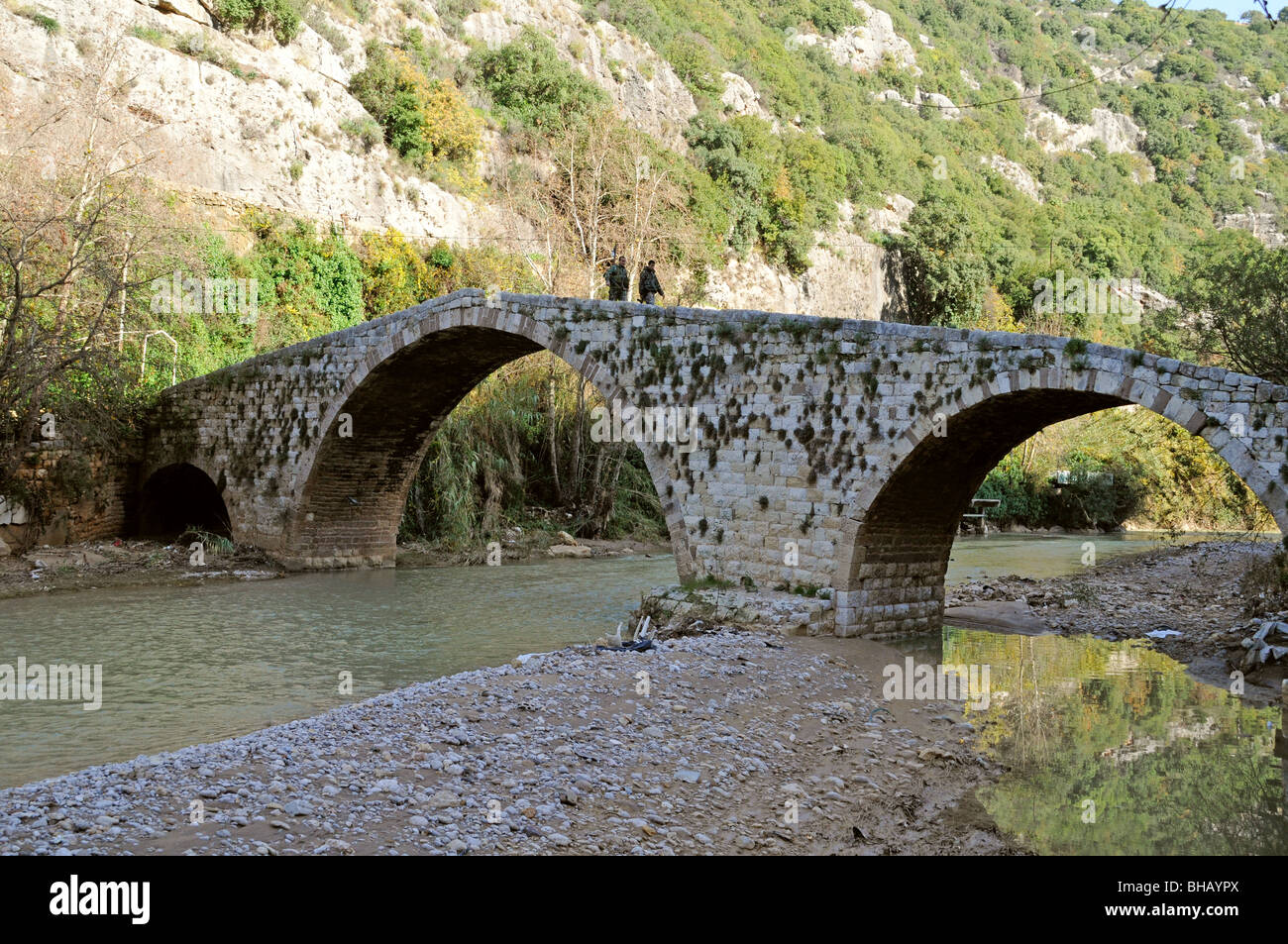 Two Lebanese army soldiers on patrol atop an old arched Mamluk era