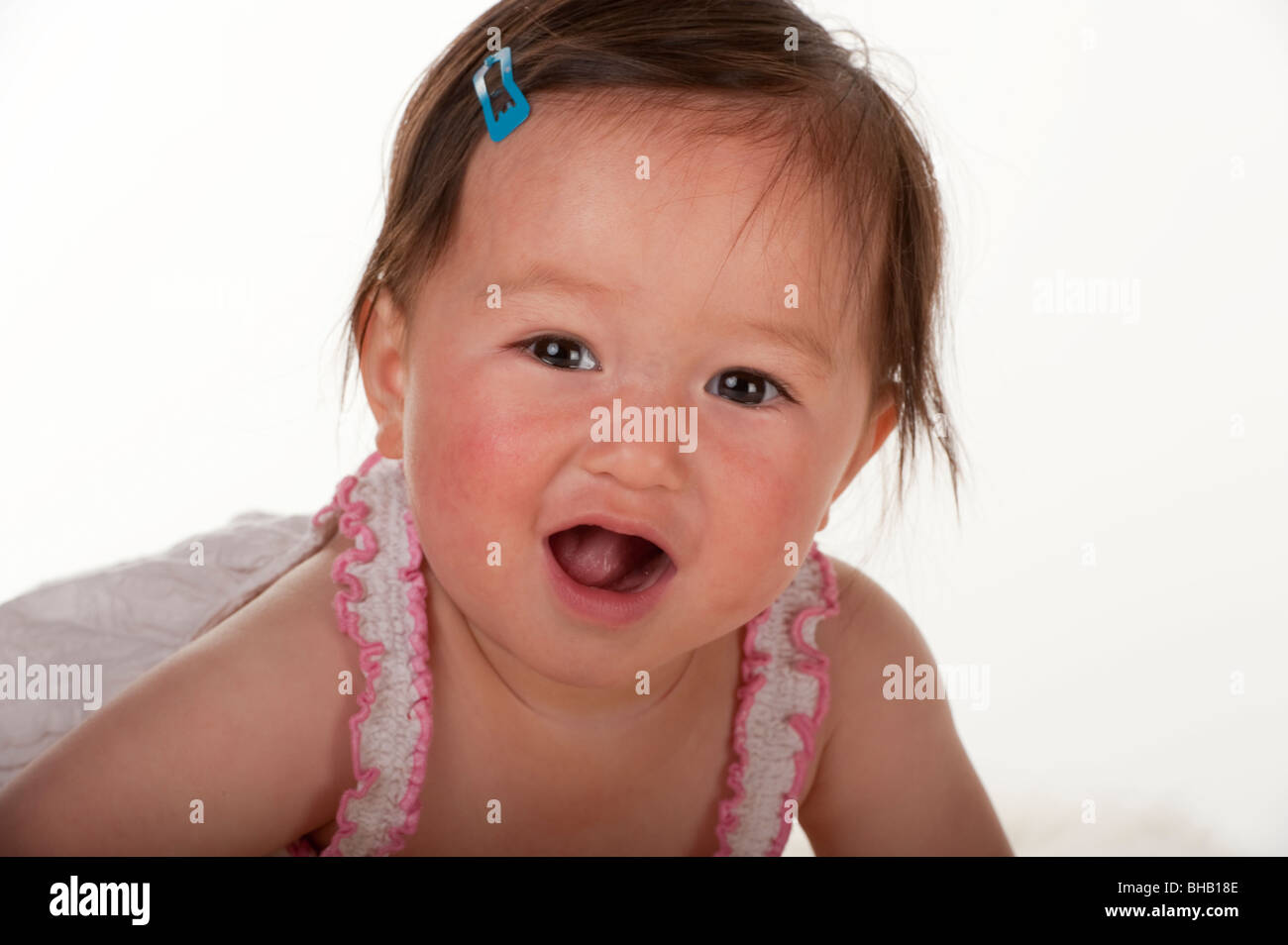 baby girl smiling and laughing at camera Stock Photo Alamy