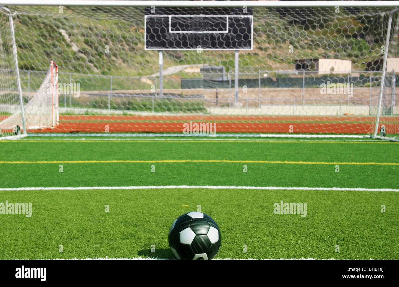 Football Placed On Penalty Spot Looking Towards Empty Goal Stock Photo Alamy