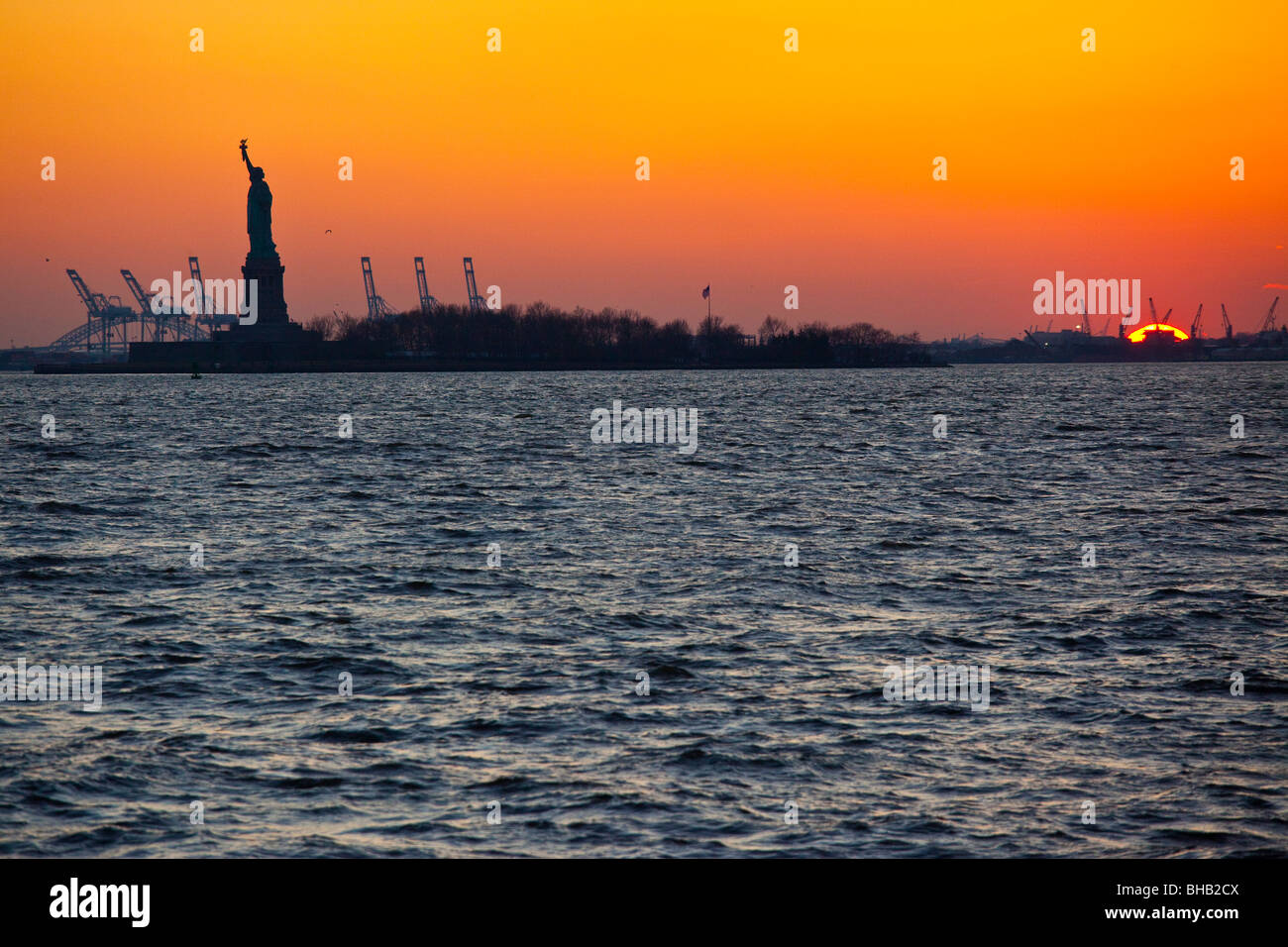 Statue of Liberty at Sunset Stock Photo