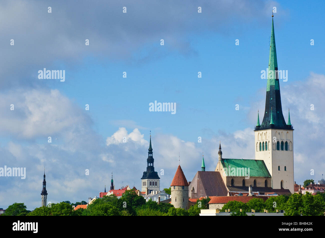 The 124m tall spire of Oleviste kirik(St Olav’s church) dominates the Old Town skyline in Tallinn, Estonia. Stock Photo