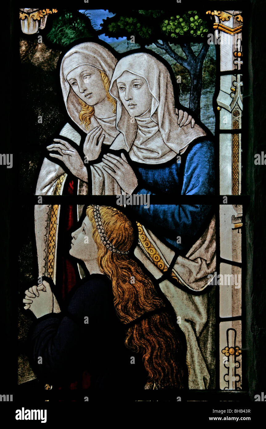 A stained glass window depicting the Three Maries at the tomb of Jesus Christ, Hawnby Church, North Yorkshire Stock Photo