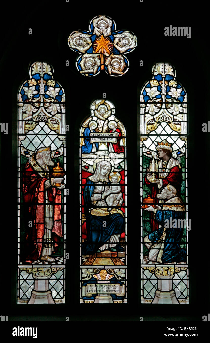 A stained glass window depicting The Nativity and the Three Magi, St Cuthbert's Church, Kildale, North Yorkshire Stock Photo