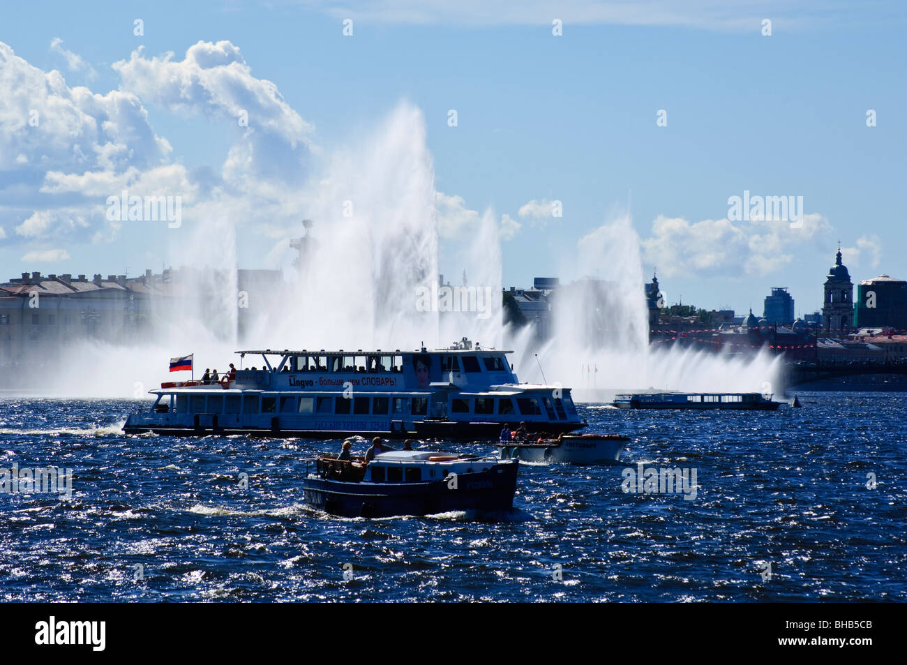 Tourist boats and fountains in the River Neva, St Petersburg, Russia Stock Photo