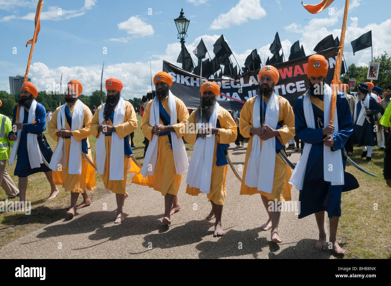 Sikhs mark the 25th anniversary of Amritsar massacres by Indian army and call for an Sikh state. Panj Piyare with swords lead Stock Photo