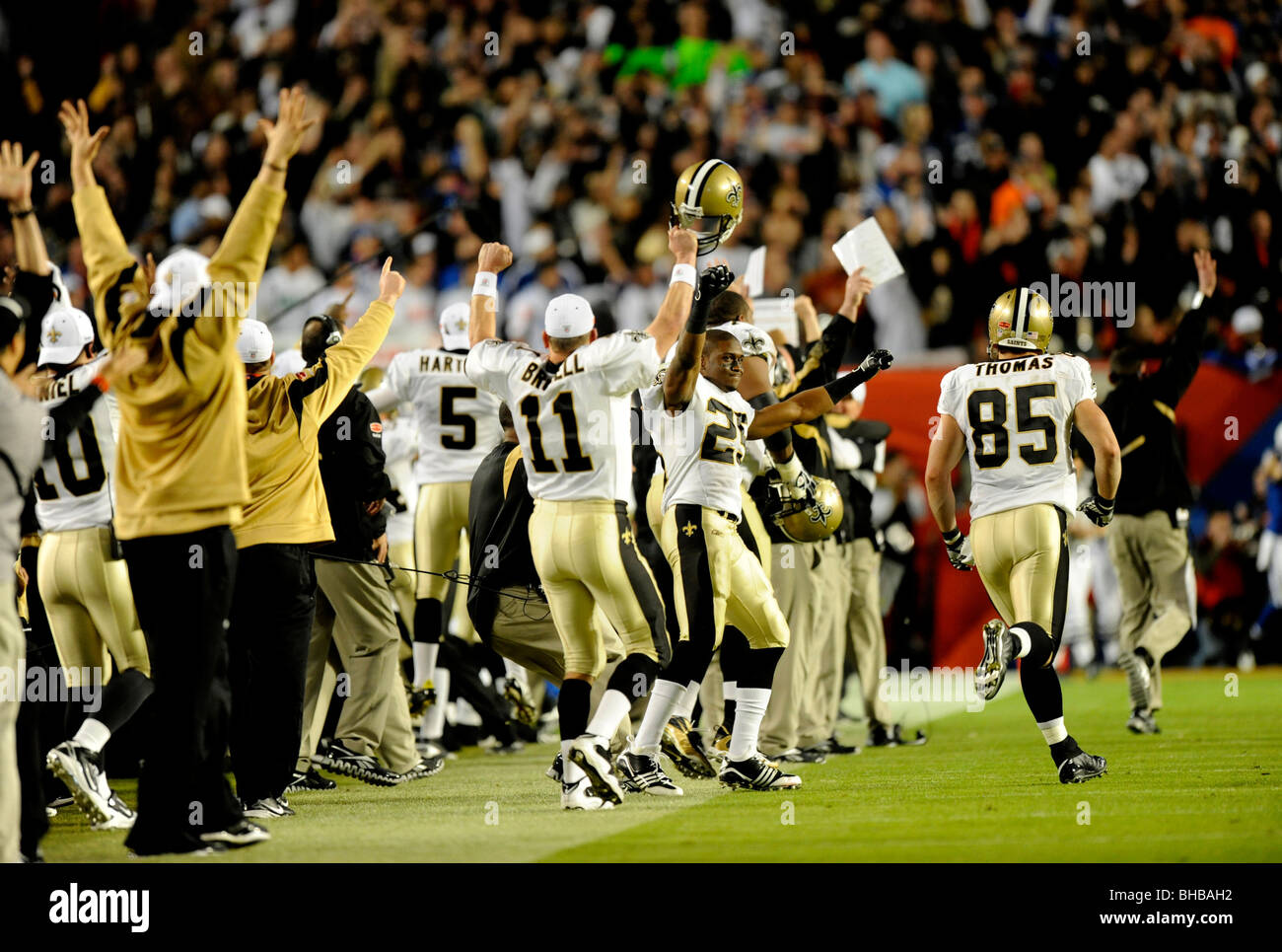 Reggie Bush #25 and members of the New Orleans Saints celebrate after defeating the Indianapolis Colts in Super Bowl XLIV Stock Photo