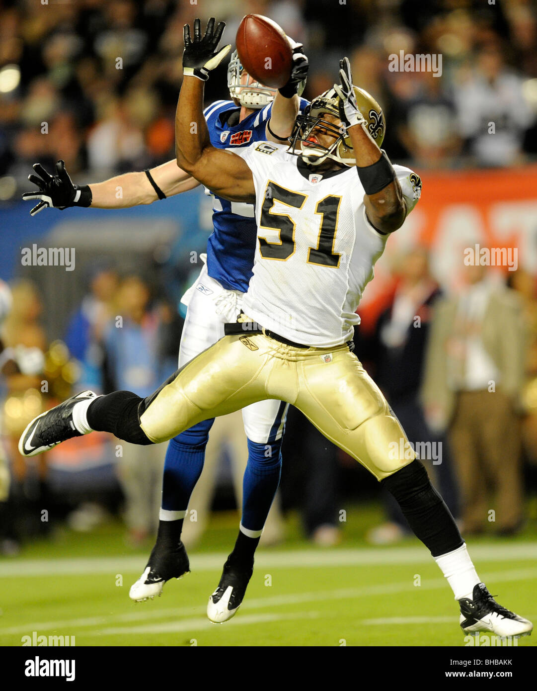 Jonathan Vilma #51 of the New Orleans Saints breaks up a pass intended ...