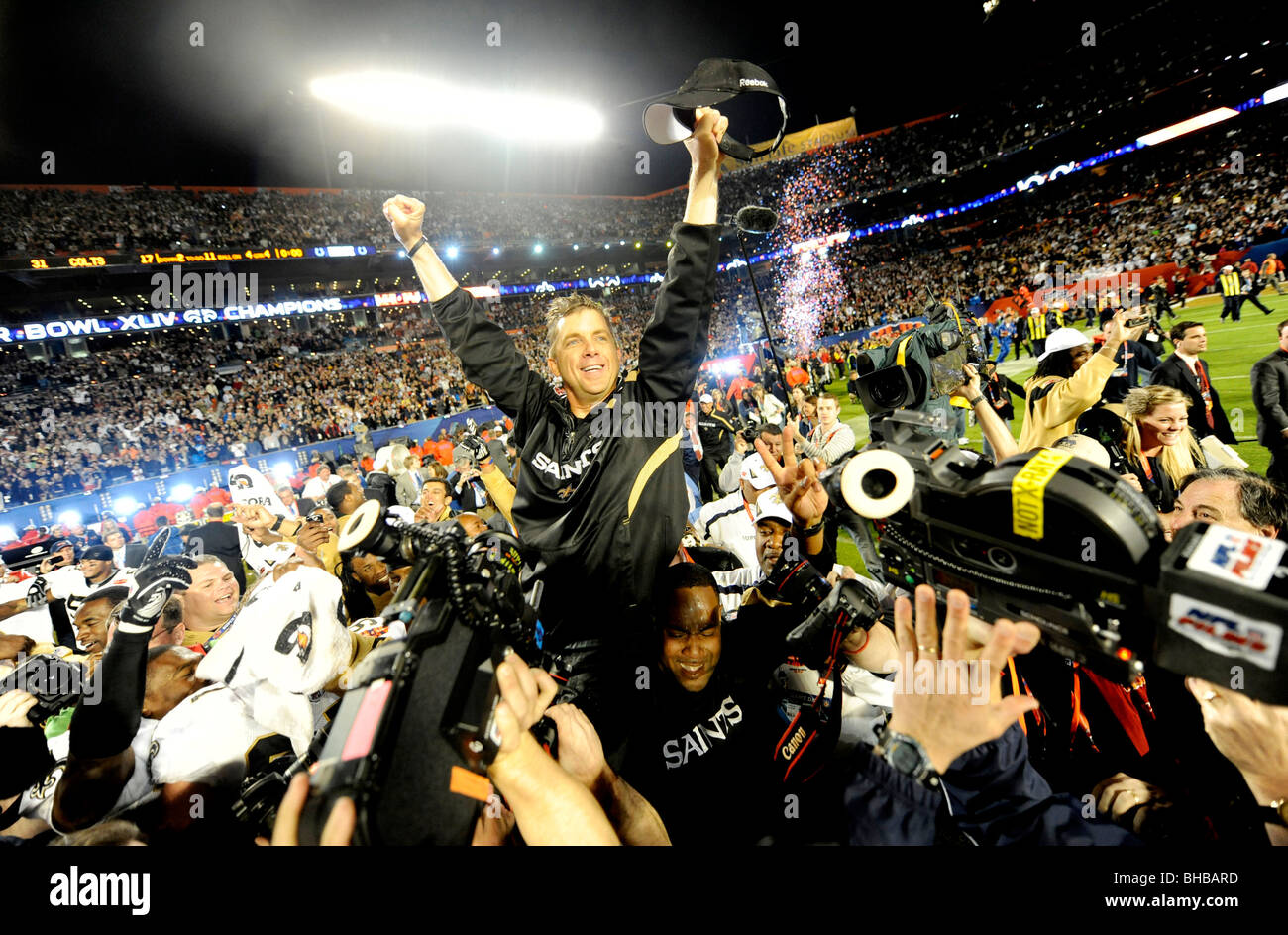 Head coach Sean Payton of the New Orleans Saints celebrates and gets carried off the field Stock Photo