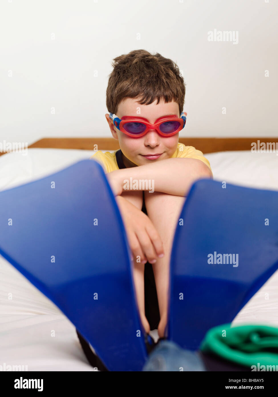 A boy wearing goggles and flippers Stock Photo Alamy