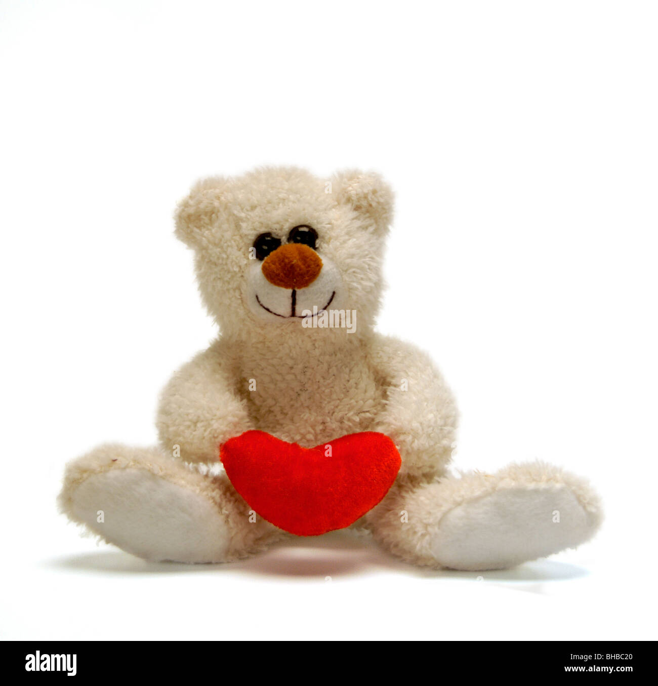 teddy bear holding love heart Stock Photo